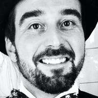 A person posing for the camera

Description automatically generated