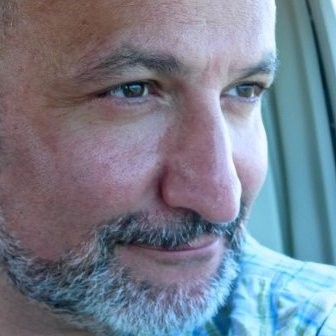 A close up of a person

Description automatically generated